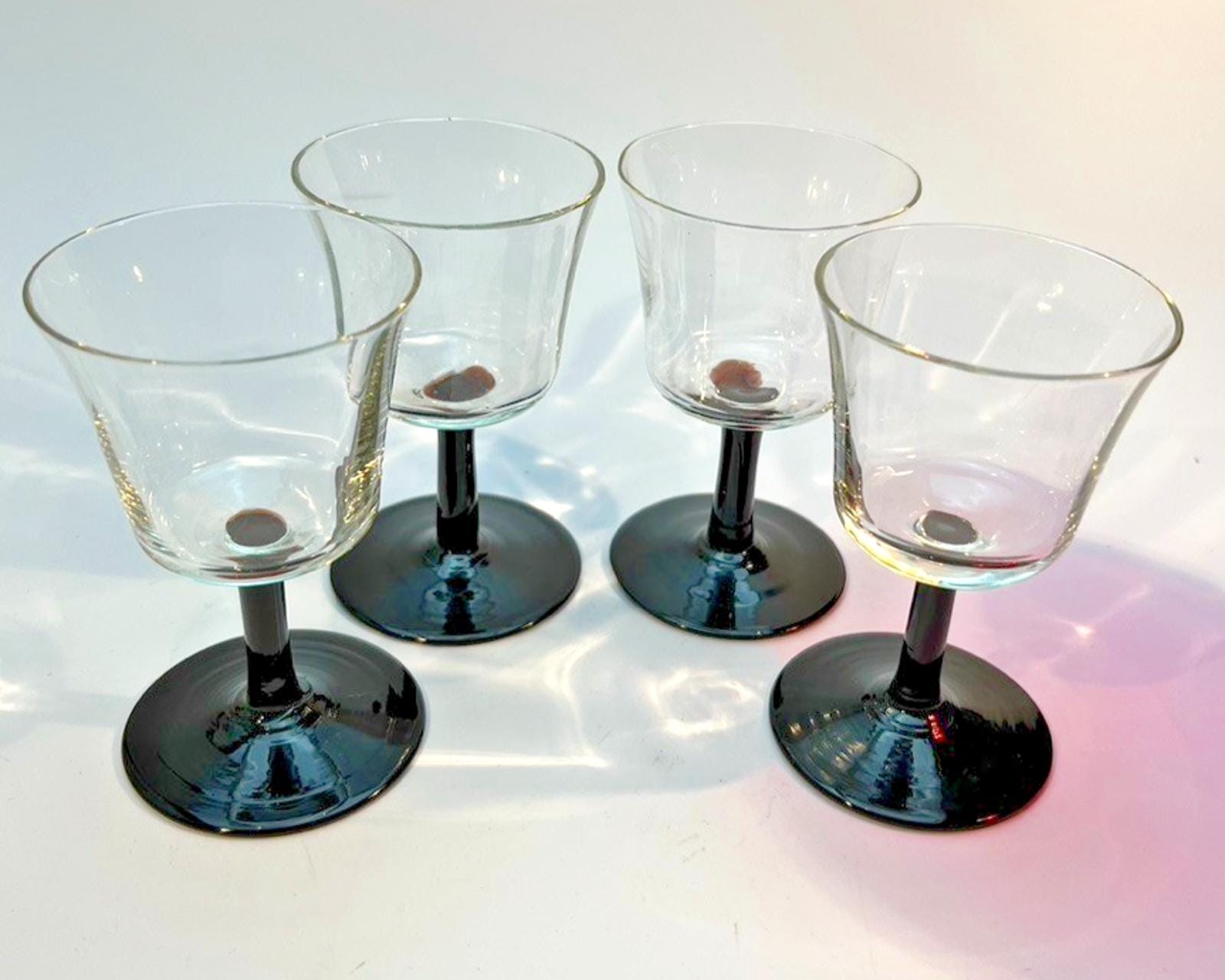 Set of 4 Vintage Stemmed Glasses. Liquor Glasses with Black Glass Stems