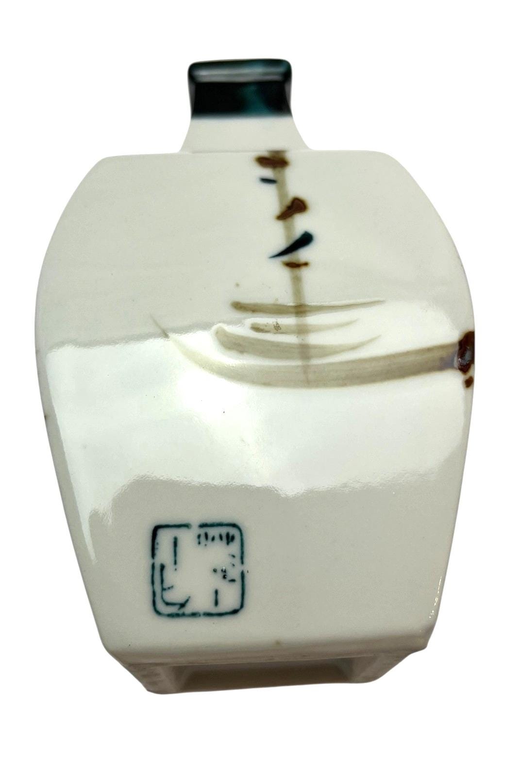 Japanese porcelain sake bottle square 14cm hand painted floral in blue/brown. Antique decorative bottle or vase