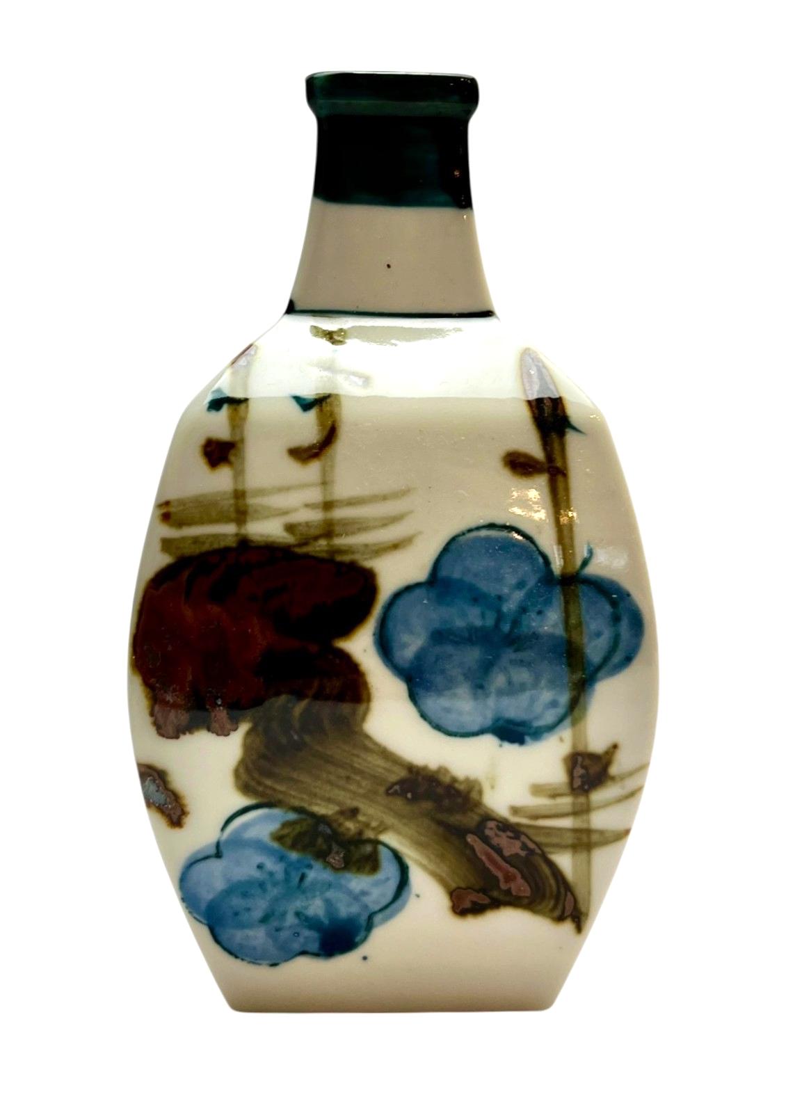 Japanese porcelain sake bottle square 14cm hand painted floral in blue/brown. Antique decorative bottle or vase