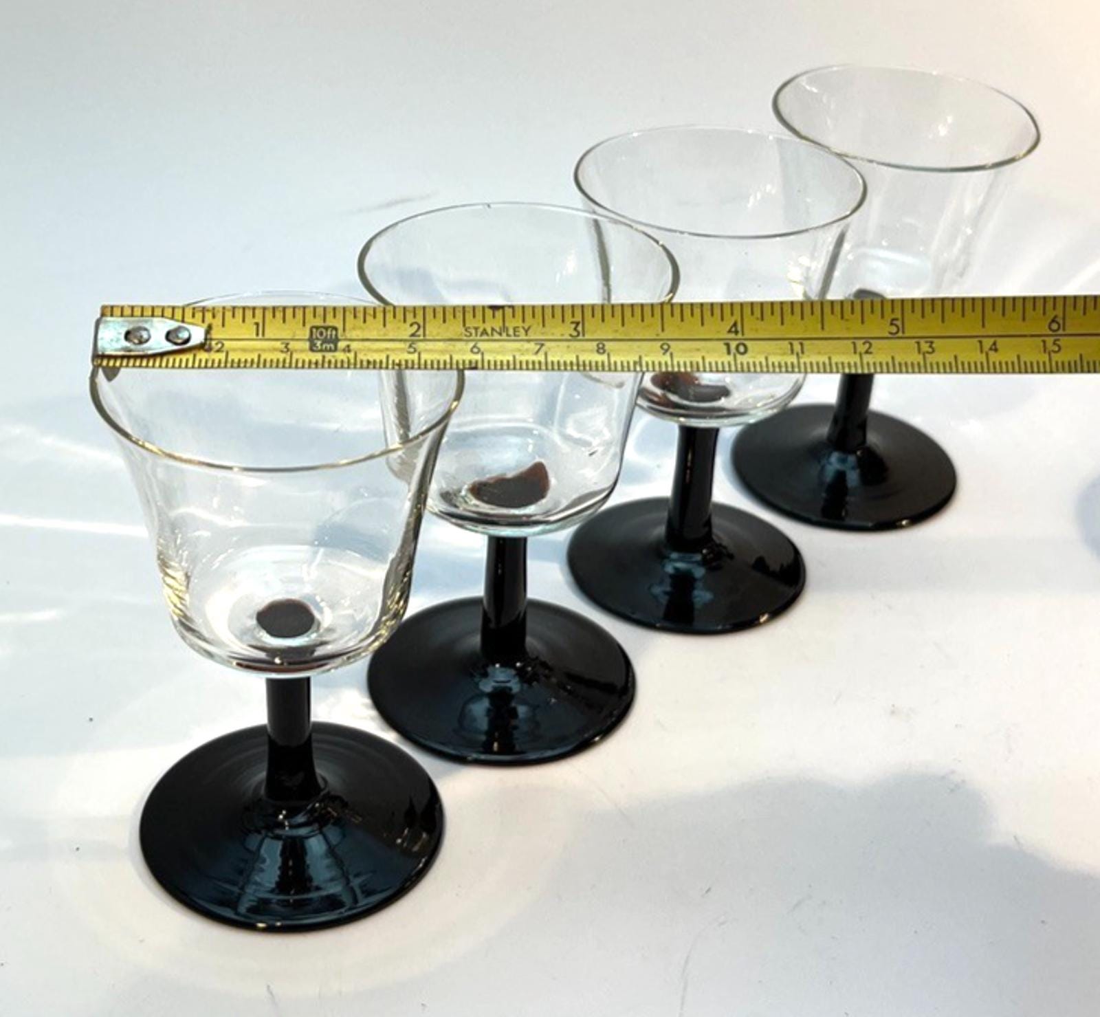 Set of 4 Vintage Stemmed Glasses. Liquor Glasses with Black Glass Stems