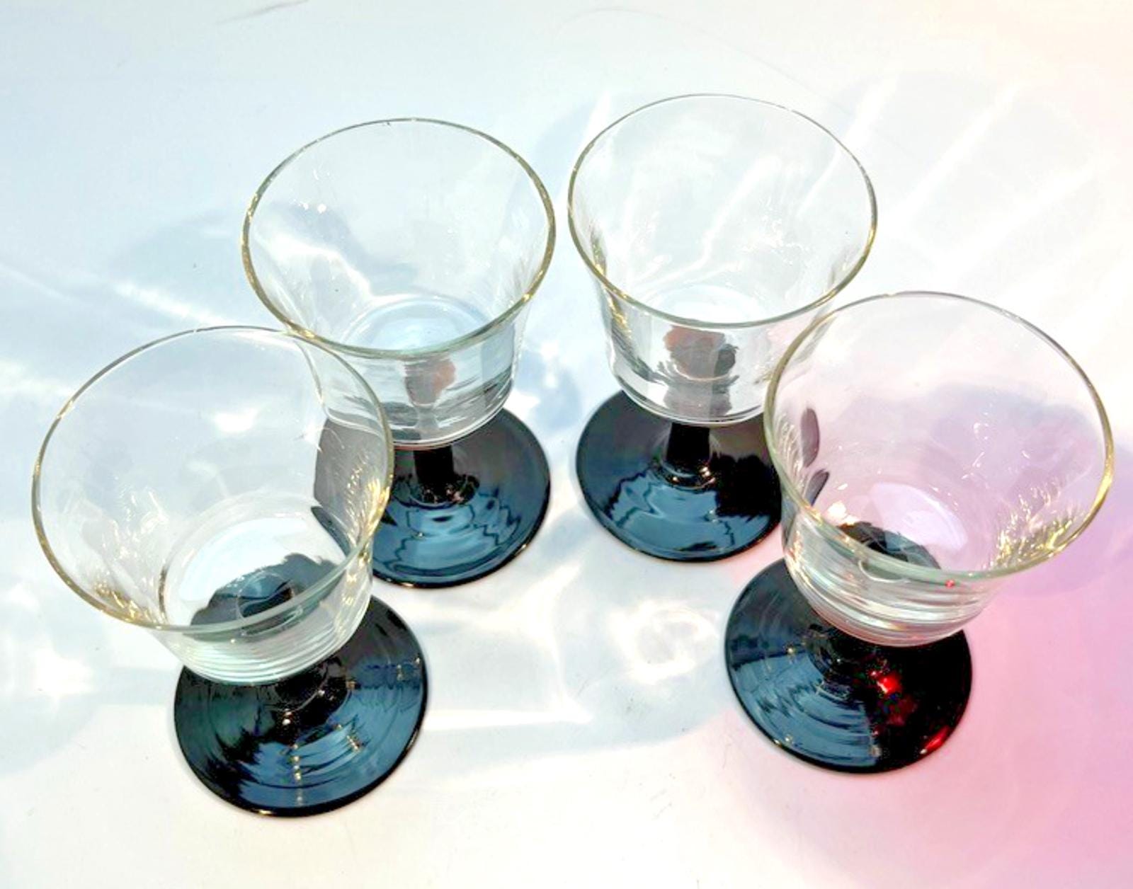 Set of 4 Vintage Stemmed Glasses. Liquor Glasses with Black Glass Stems