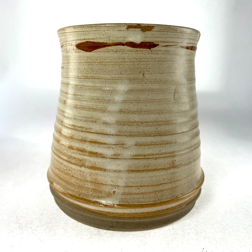 Mid century studio pottery vase with hand painted floral decoration on beige